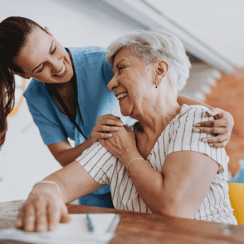 live-in carer helping senior lady